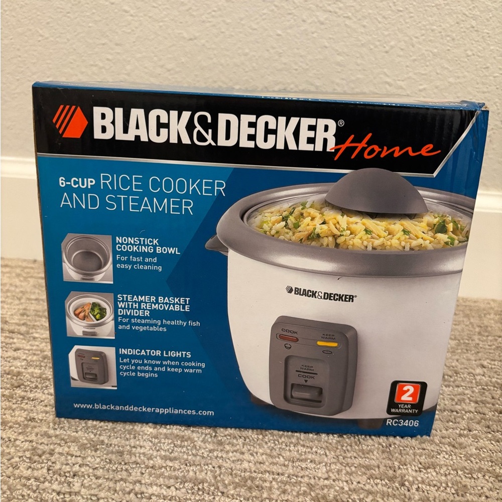 SOLD New-in-box Black and Decker 6 cup rice cooker and steamer RC3406 open box